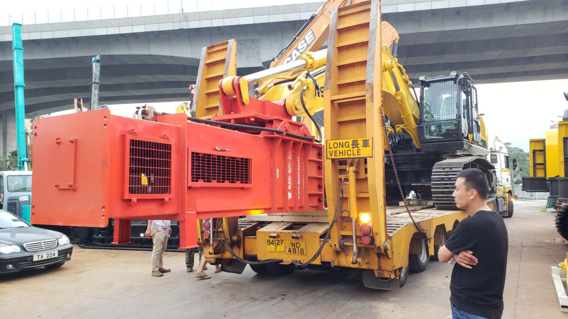 Rapid impact compactor on a transporter